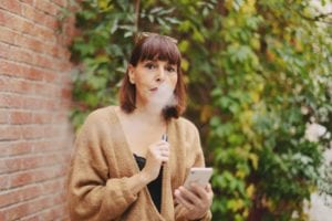 lady vaping e-cigarette