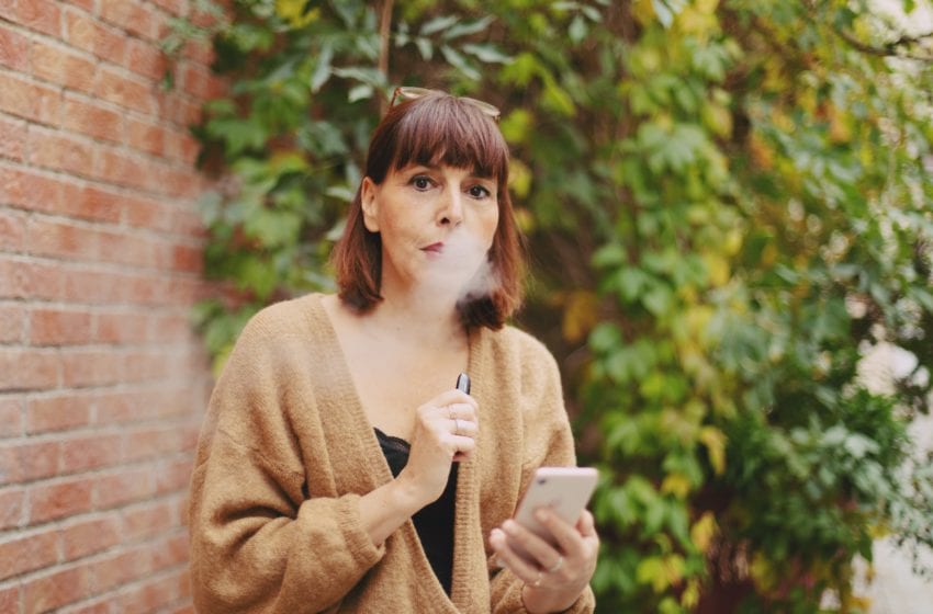 lady vaping e-cigarette